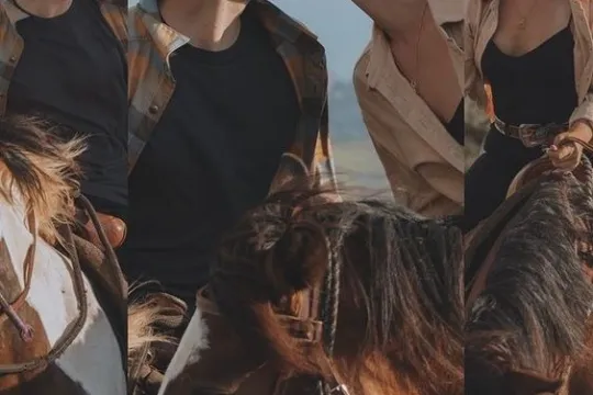 a group of people riding on the back of a horse